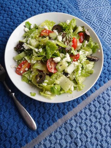 Mediterranean salad in white bowl