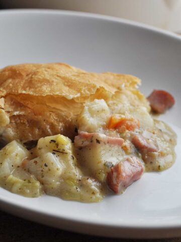 Ham & Leek pie on white plate