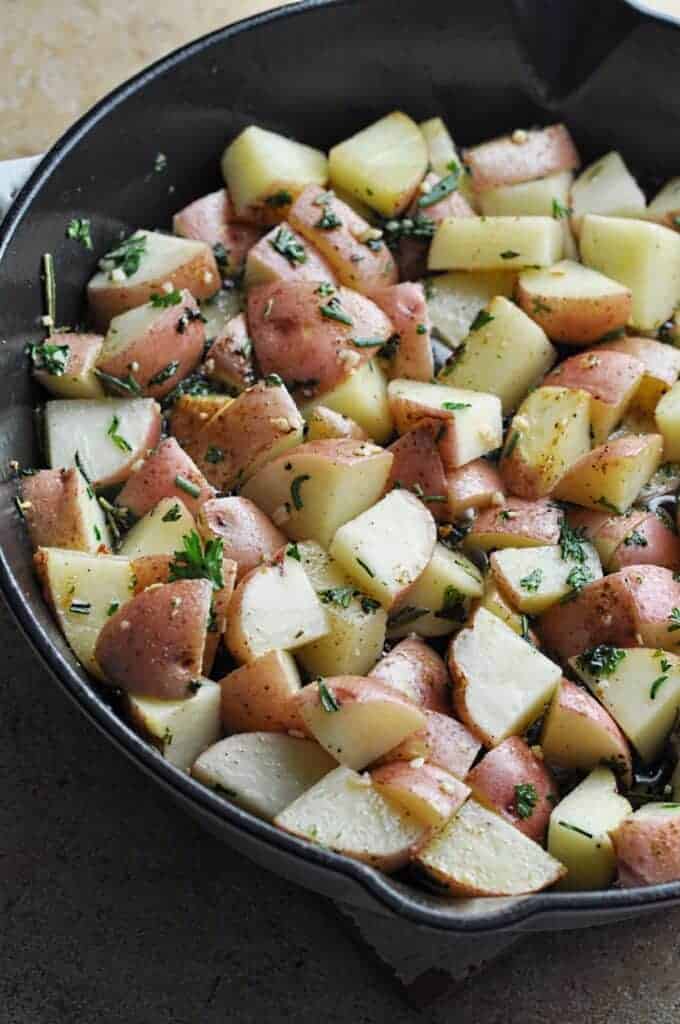 Potatoes chopped cooking in pan