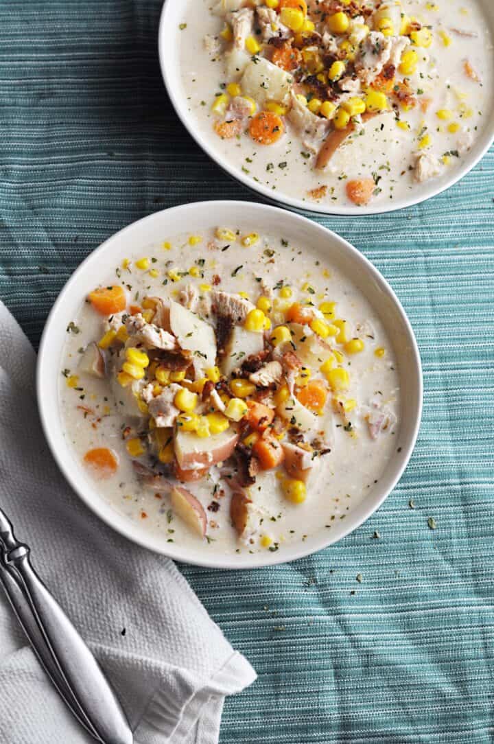 Chicken chowder in bowl with corn and potatoes