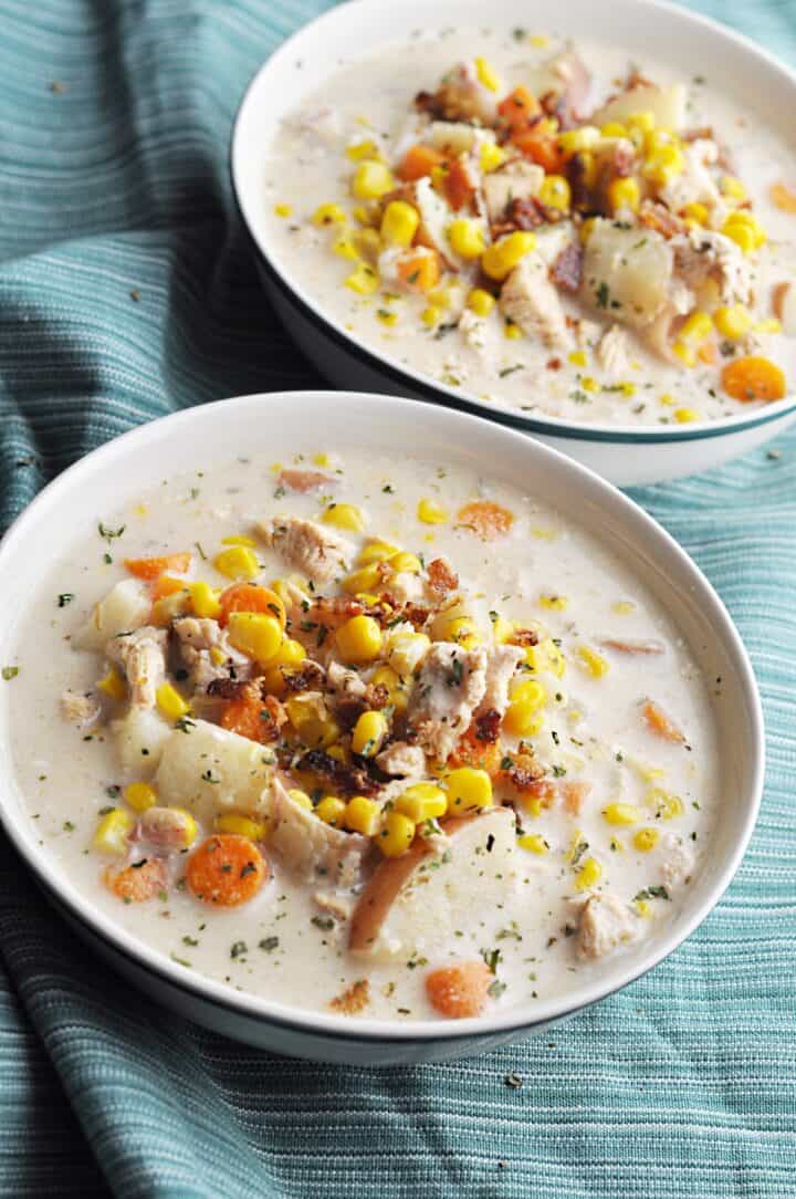 Potato chowder with chicken and corn in bowl