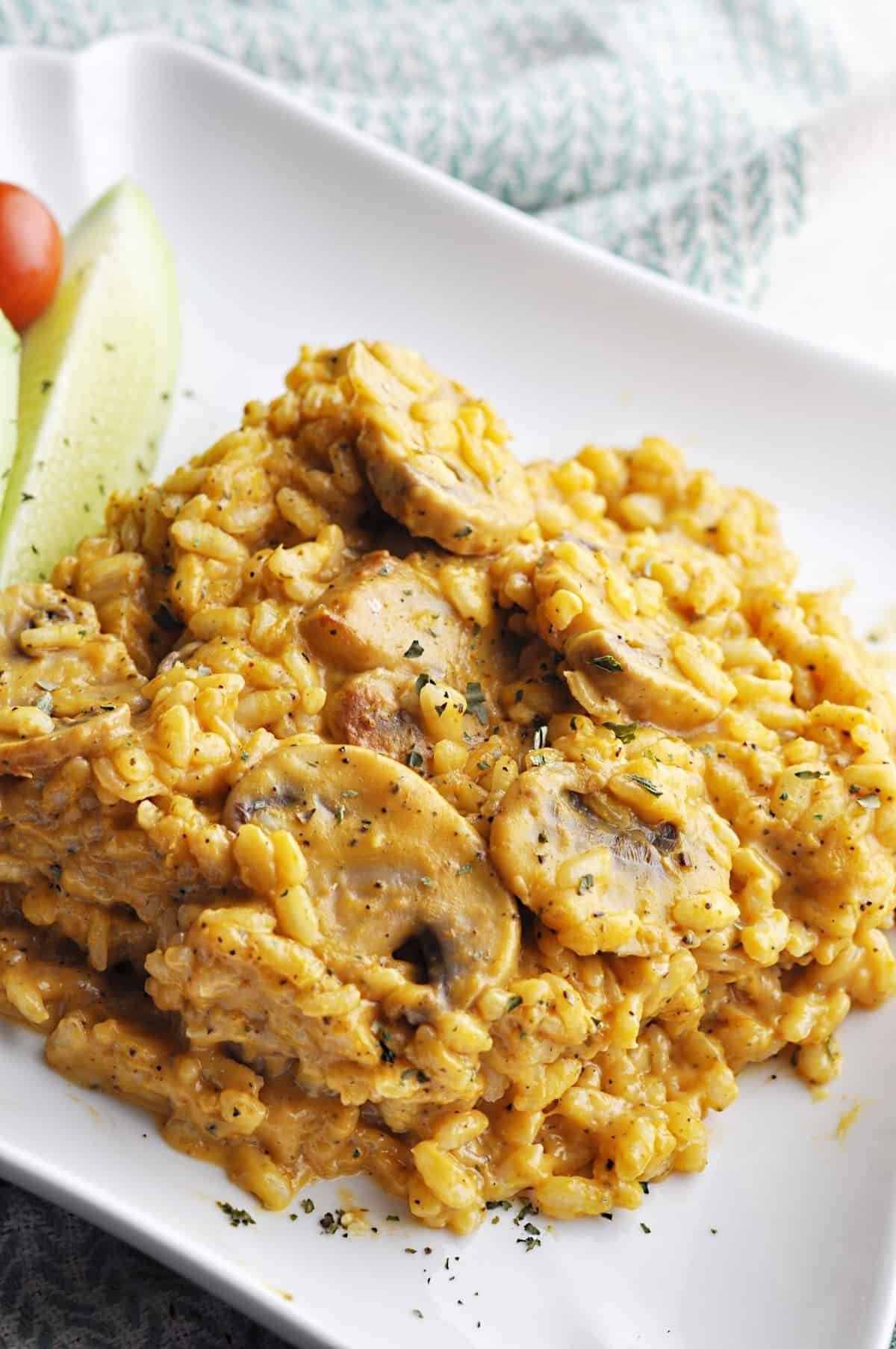 Arborio rice with pumpkin and mushrooms on plate