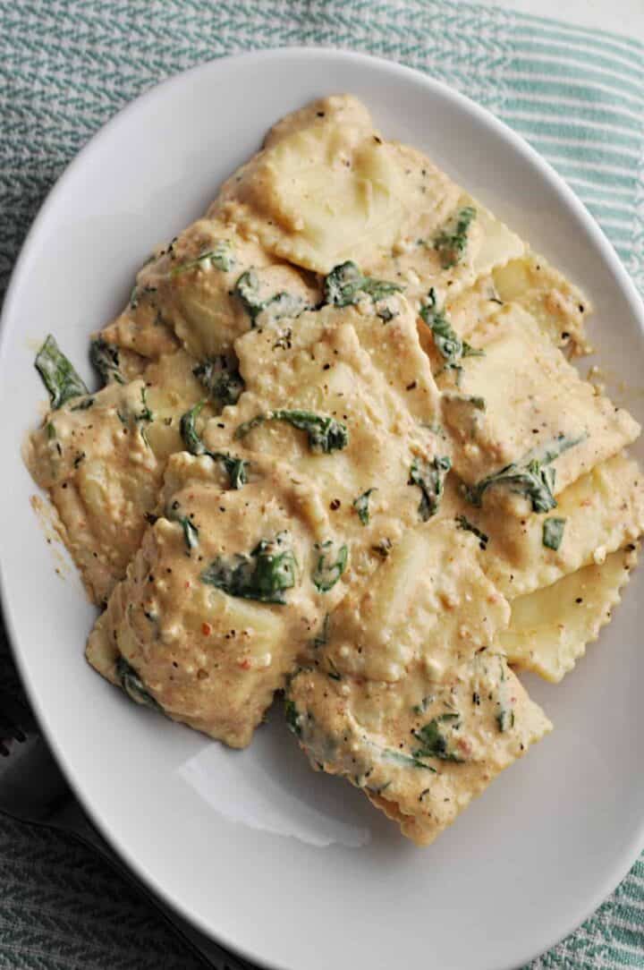 Spinach Ravioli Recipe with Tomato Basil Cream Sauce - Savory With Soul