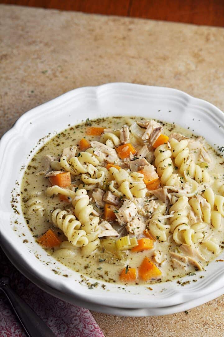 Creamy noodle soup with turkey and vegetables