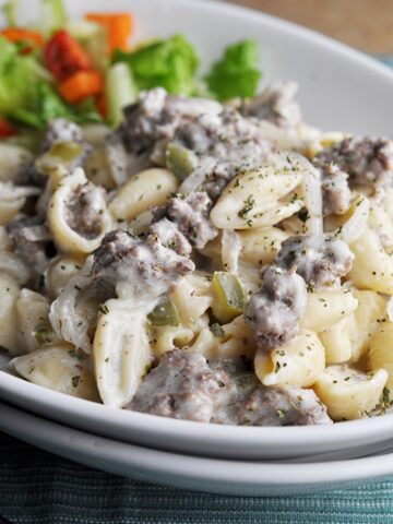 Ground beef cheese and shells with salad
