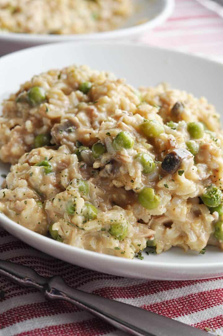 Serving of tuna casserole with rice and peas