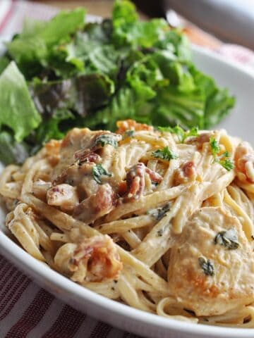 Pasta with creamy sauce chicken and bacon