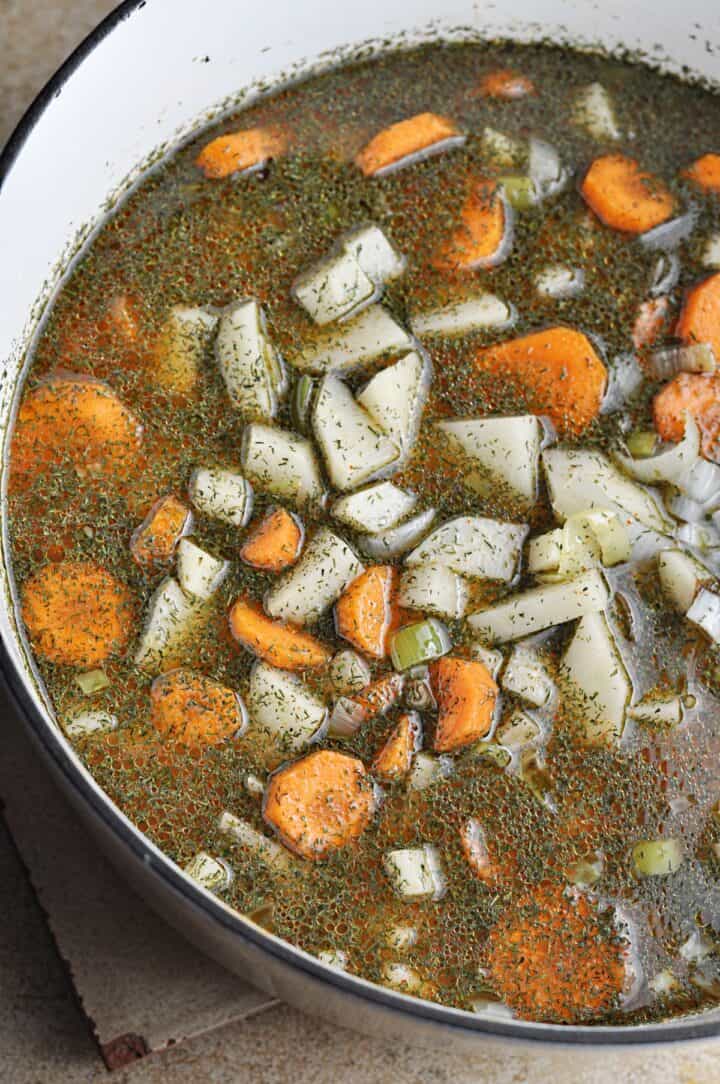 Soup with dill, potatoes, and carrots