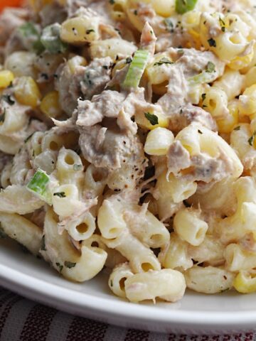 Macaroni salad with tuna and corn on a plate